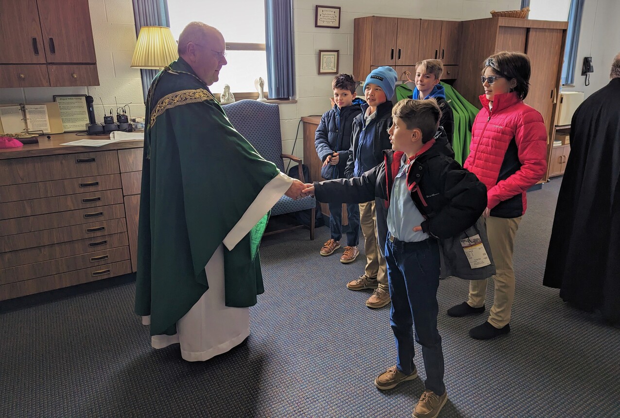 Mass, ambo blessing highlight bishop’s visit to Assumption Academy