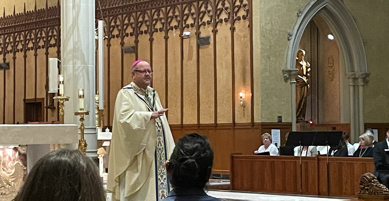 First diocesan young adult Mass focuses on Jesus, redeemer and king