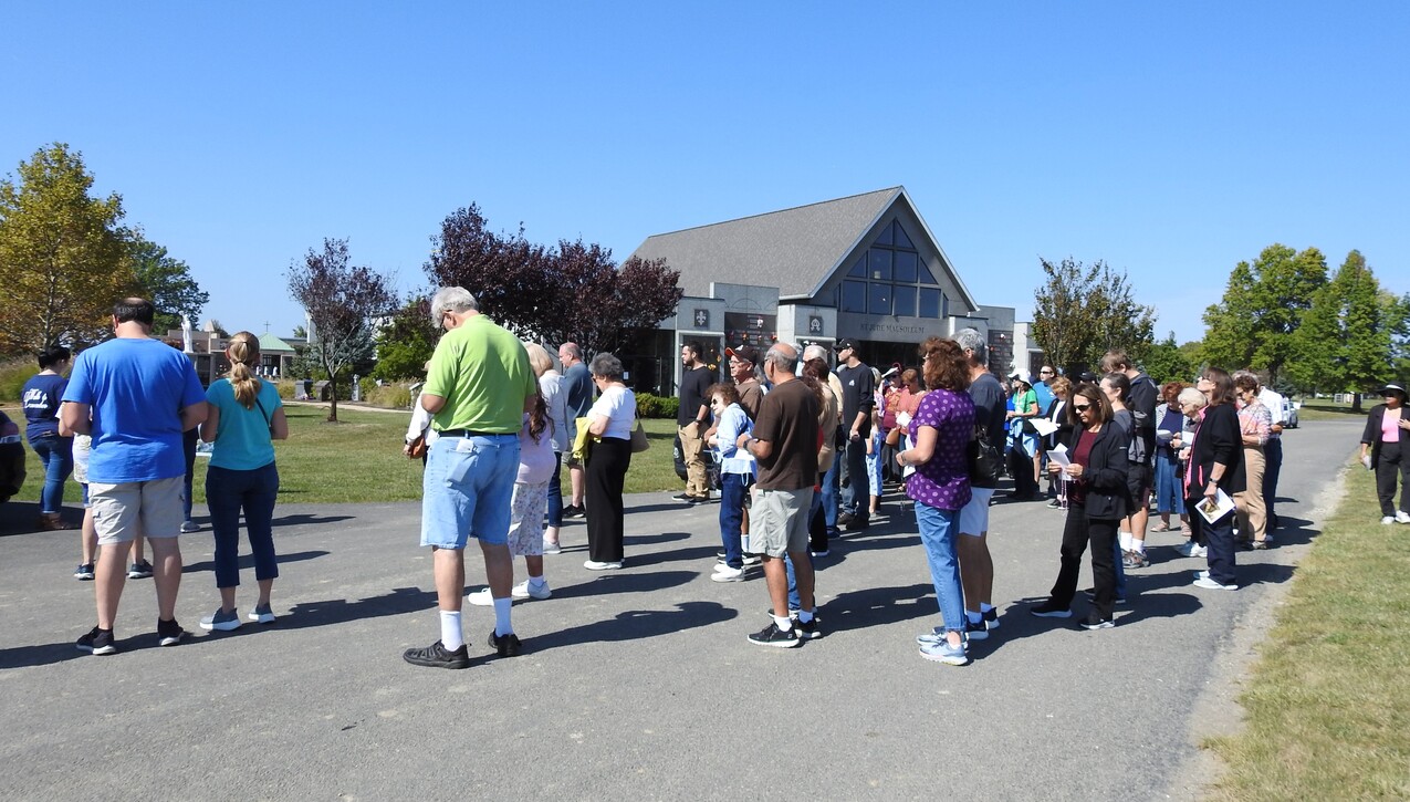 Annual Walk to Remember draws hundreds at seven Catholic cemeteries