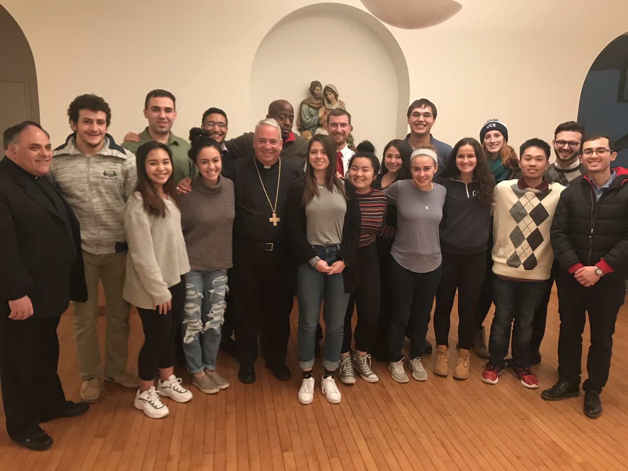 Prayer, food, conversation highlight bishop’s visit with Case Catholic Campus Ministry