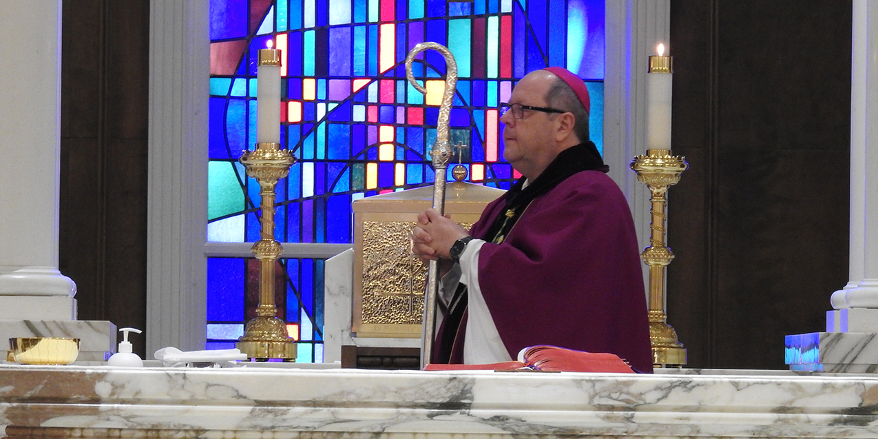 Bishop’s visit to St. Francis of Assisi Parish makes pastor’s birthday special