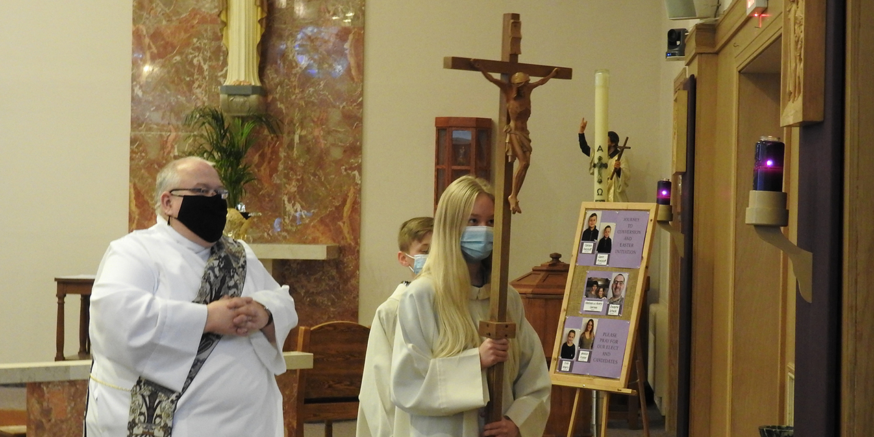 St. Francis Xavier faithful pray Stations of the Cross with bishop