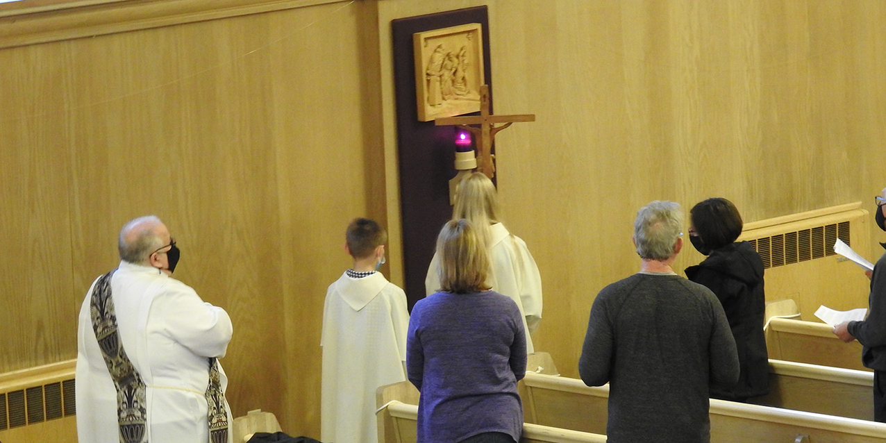 St. Francis Xavier faithful pray Stations of the Cross with bishop