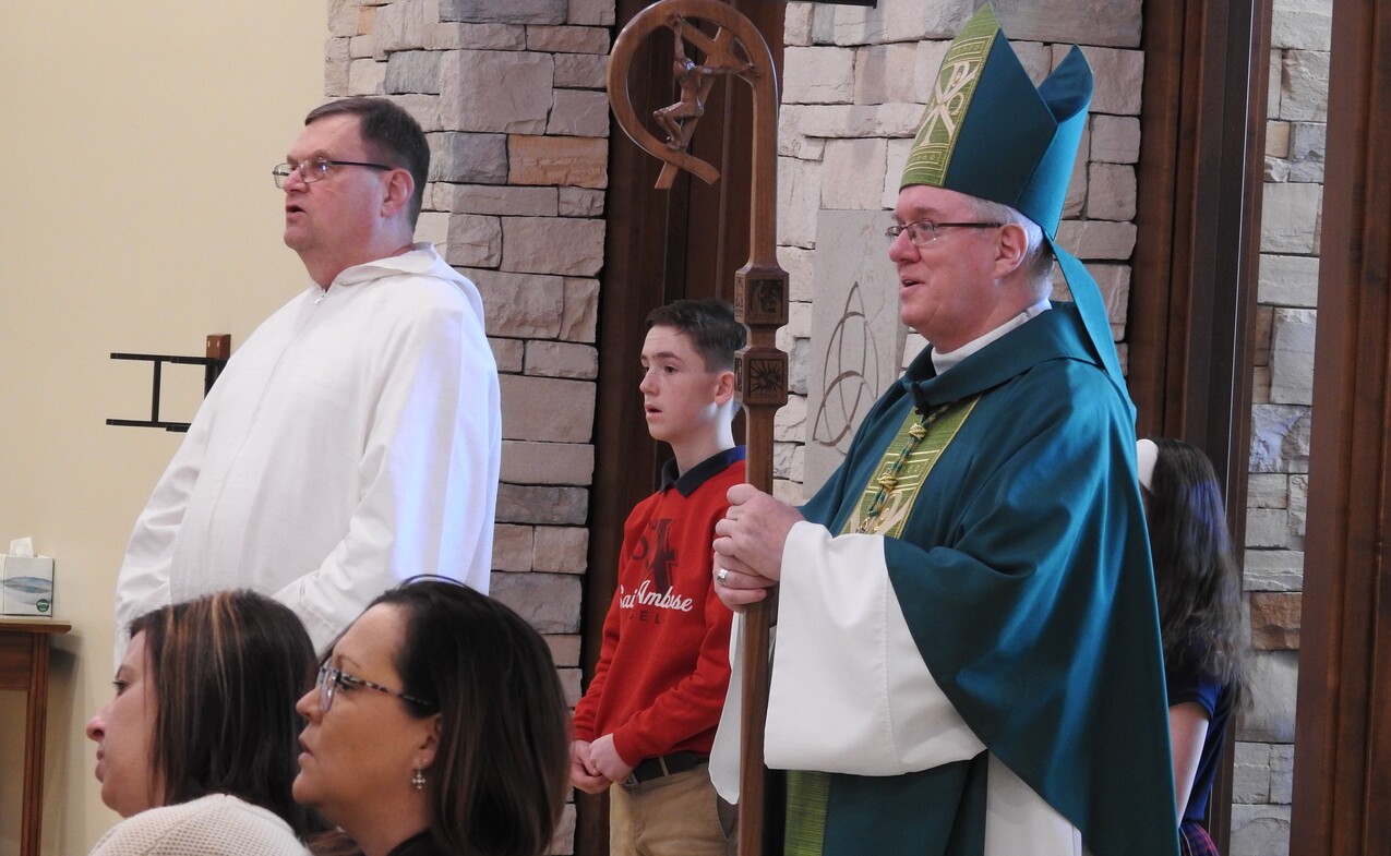 St. Ambrose School welcomes Bishop Woost for Mass, visit