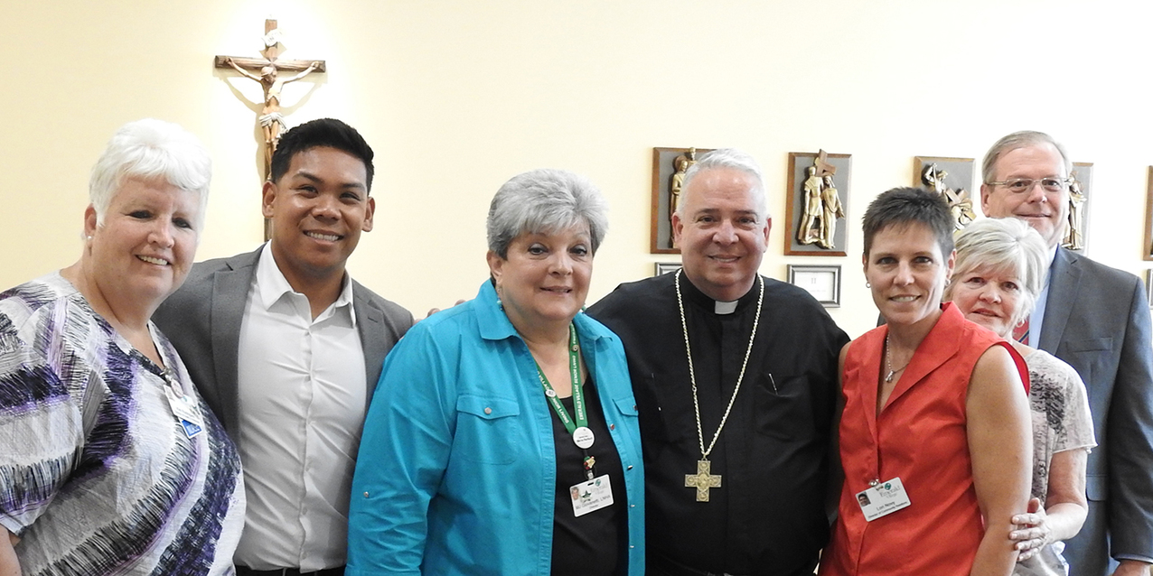 Visit by Bishop Perez brightens Emerald Village residents’ day