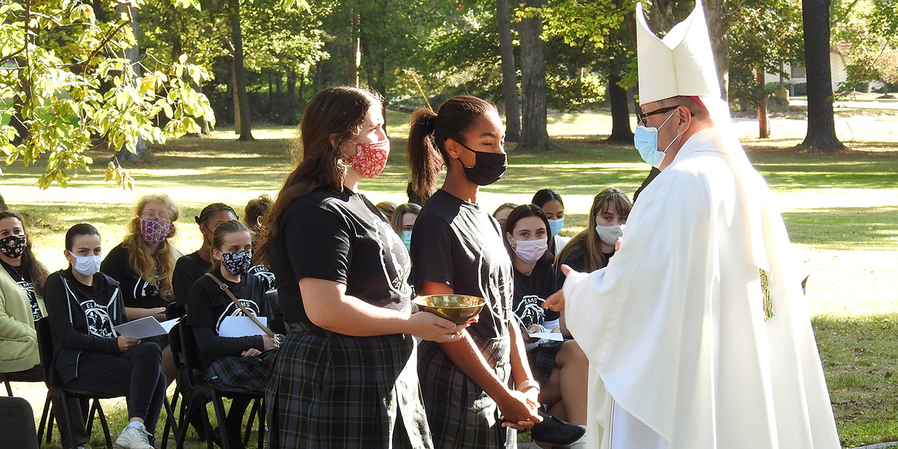 Outdoor Mass, picnic lunch highlight bishop’s visit to Our Lady of the Elms