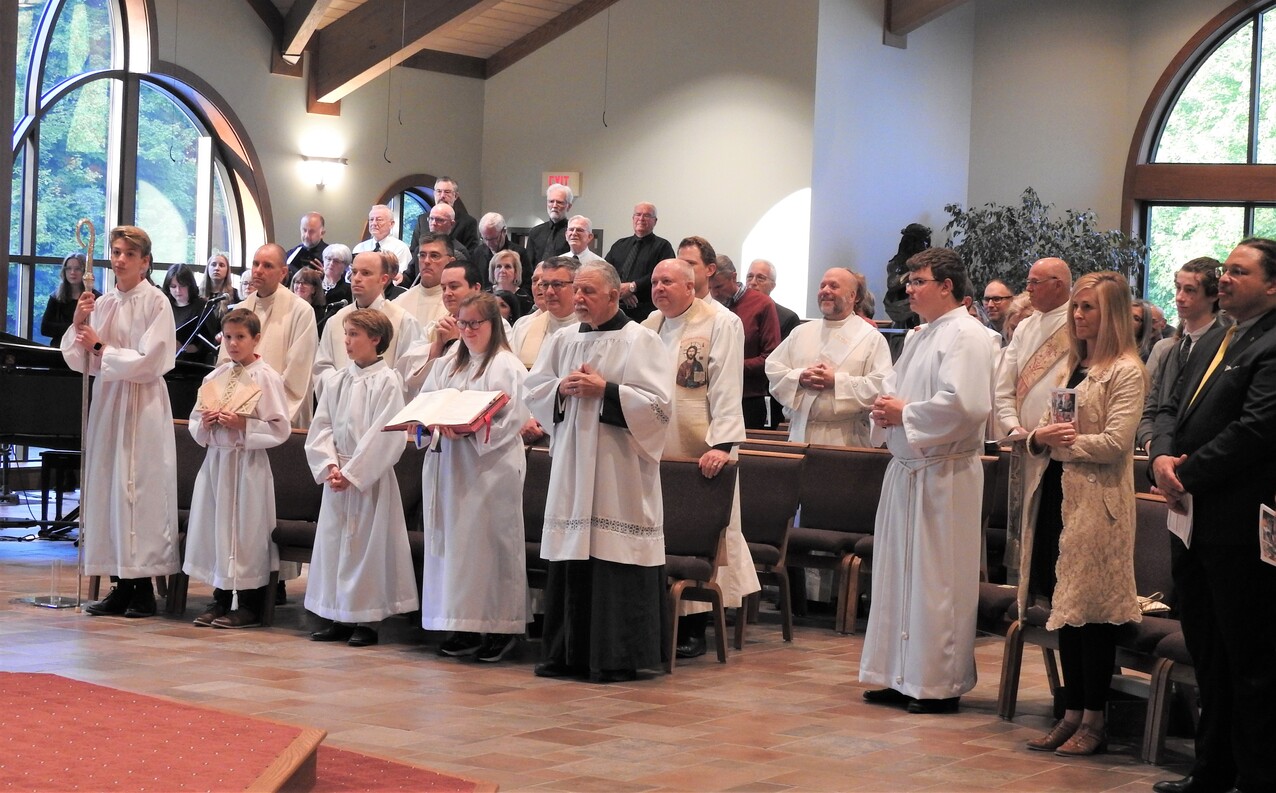 Father Max Cole installed as pastor, Church of the Holy Angels