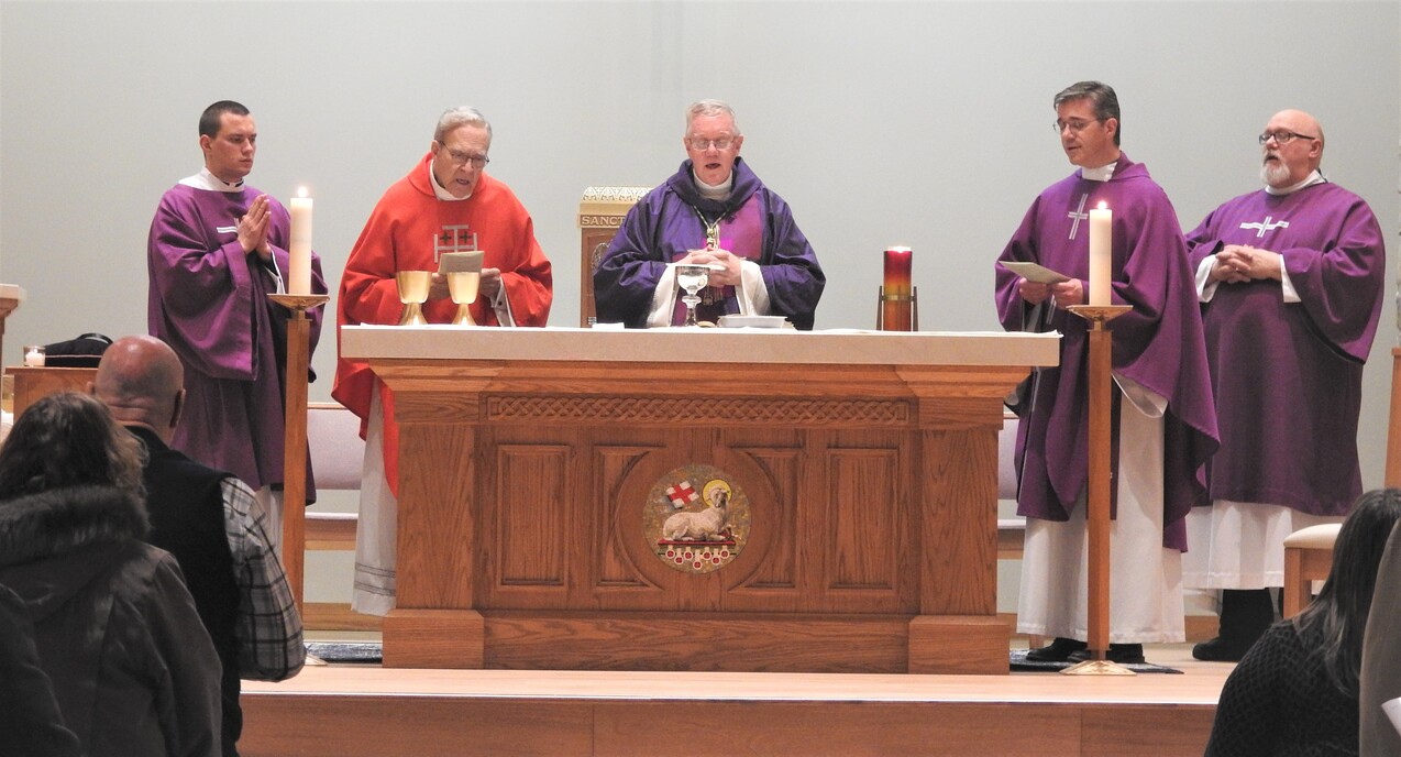 Bishop Woost dedicates new altar at St. Brendan Parish