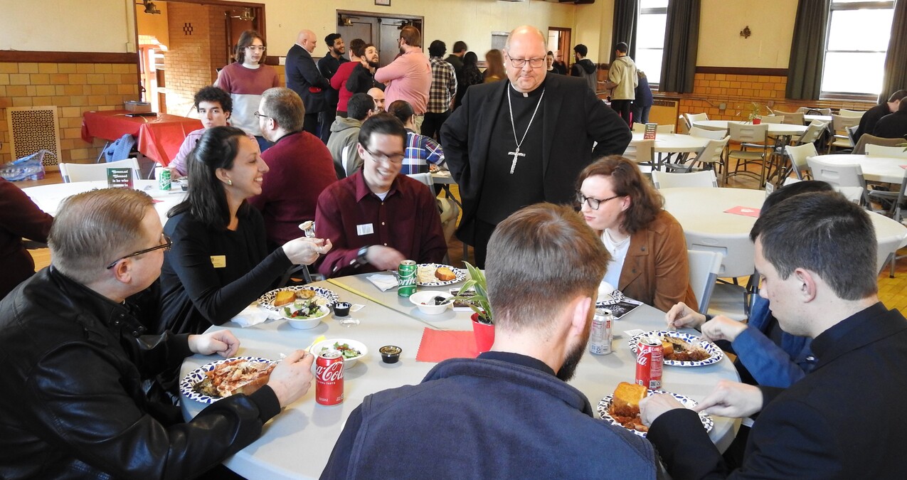 Inaugural College Night Out attracts nearly 100 for Mass, dinner, concert, prayer