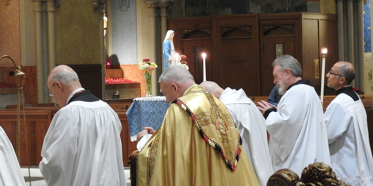 Legion of Mary members gather for prayer, procession, adoration