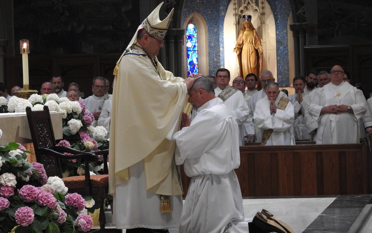 Two men ordained for ministry as permanent deacons