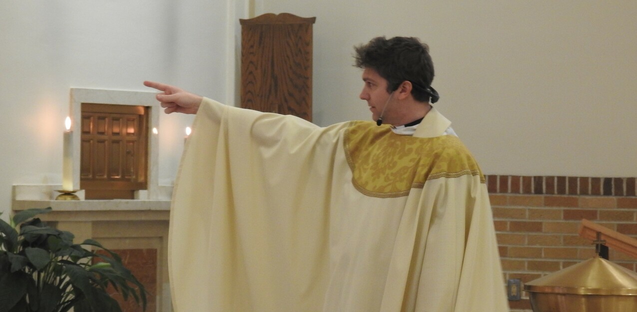 Bishop installs Father Ryan Cubera as St. Mary of the Falls pastor