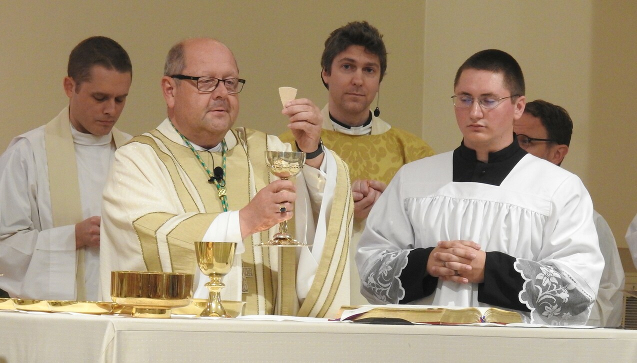 Bishop installs Father Ryan Cubera as St. Mary of the Falls pastor