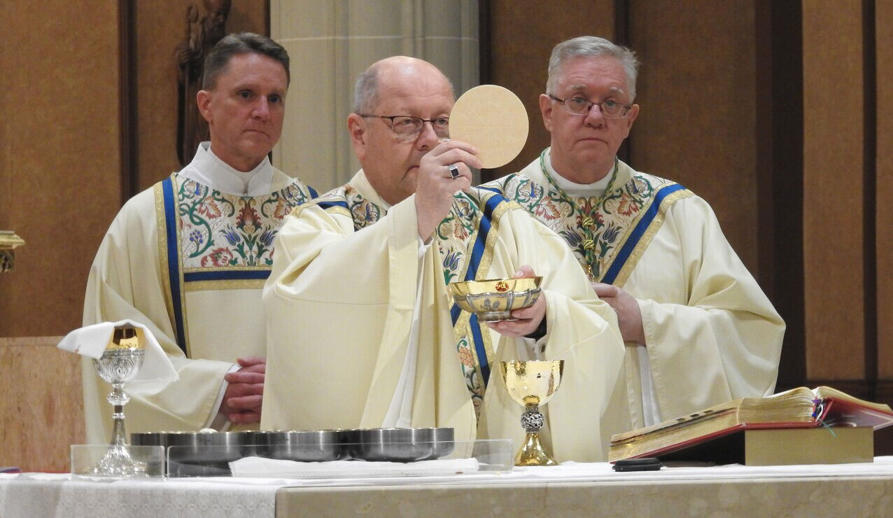 Bishop Woost invites faithful ‘to enter the mystery’ at Mass of the ...