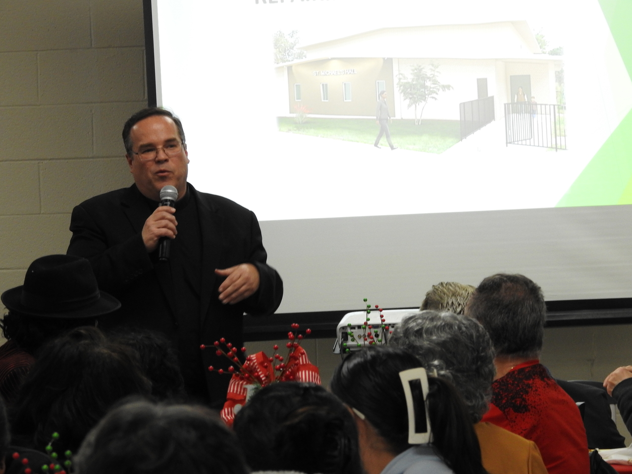  Newly renovated St. Michael the Archangel Parish Hall is blessed by Bishop Malesic