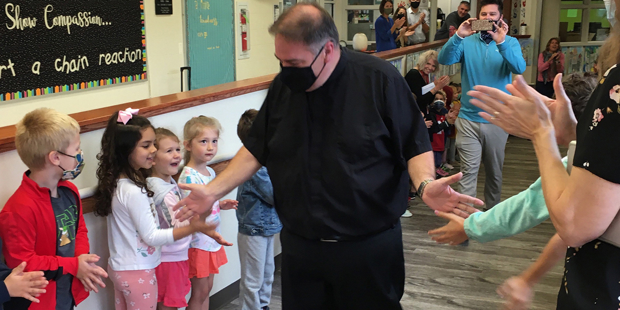 Father Vince Hawk installed as pastor of Holy Trinity Parish, Avon