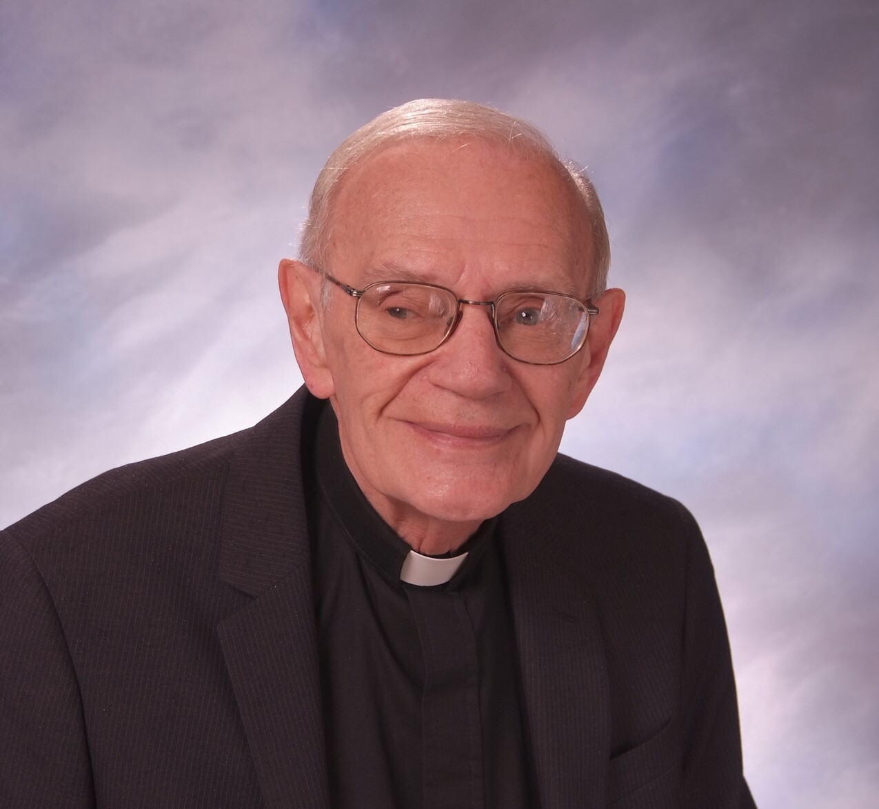 In remembrance – Father John G. Crawford