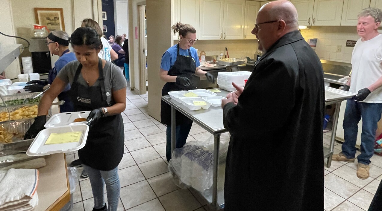 Bishop prays stations, enjoys fish fry at Visitation of Mary Parish in Akron 