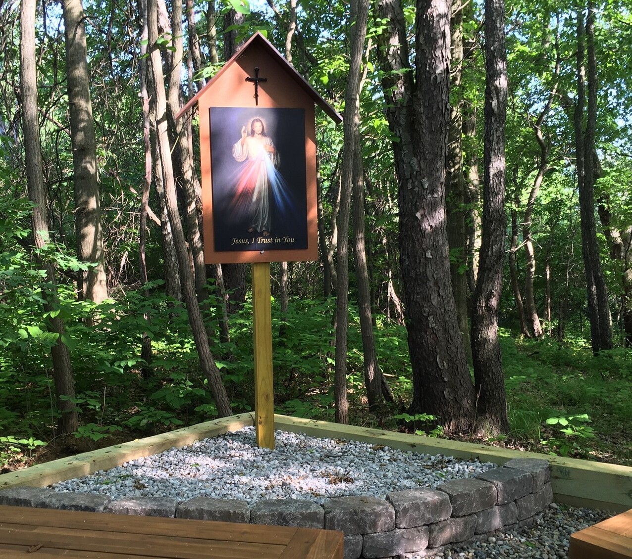 Eagle Scout refurbishes Divine Mercy Shrine in Woods