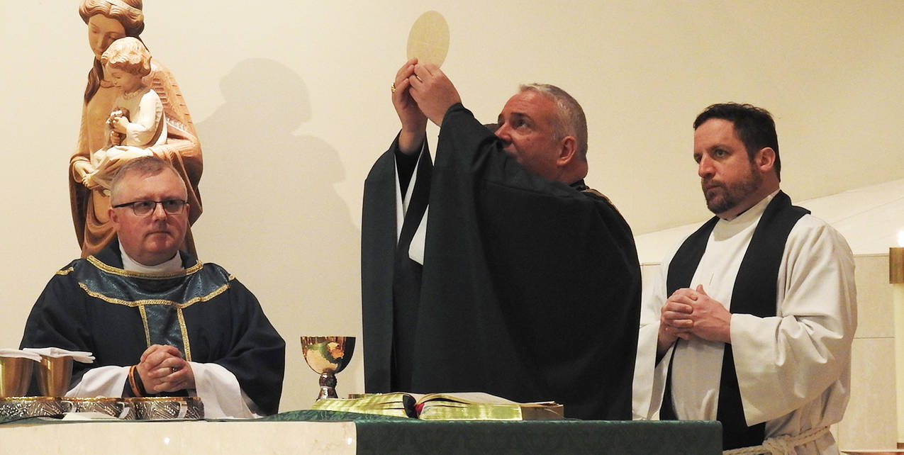 Father John Mullee installed as pastor at St. Michael Parish, Independence
